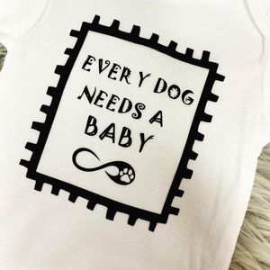EVERY DOG NEEDS A BABY ONESIE